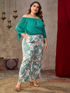 Conjunto Plus Size Top Solto com Decote Amplo em Cor Sólida e Calças Estampadas Espaçosas