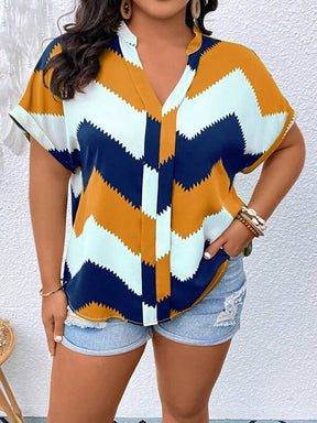 Blusa Plus Size com Estampa Chevron e Manga de Asa de Morcego