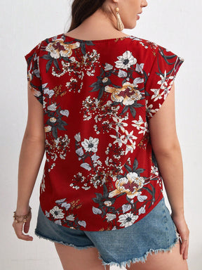 Blusa Plus Size com Estampa Floral e Manga de Borboleta