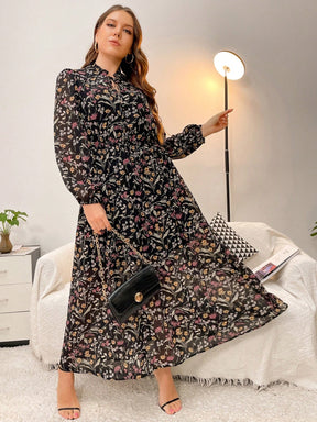 Vestido Plus Size Elegante com Estampa Floral e Detalhes em Babado e Gola com Laço